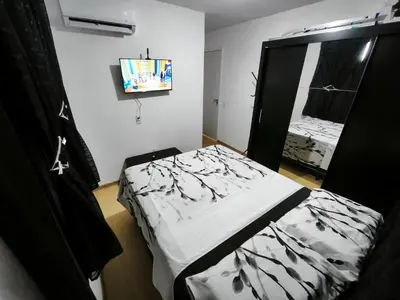 Uma cama ou camas num quarto em Mirante Clube