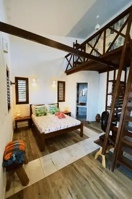 Uma cama ou camas num quarto em Casa do Prãna