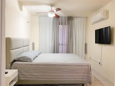 Uma cama ou camas num quarto em Apartamento Meireles Excelente Localização