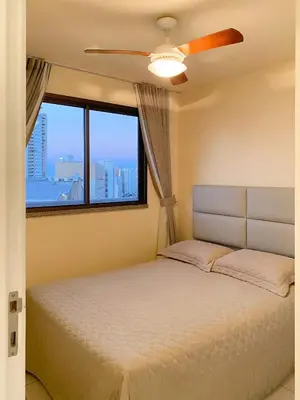 Uma cama ou camas num quarto em Apartamento Meireles Excelente Localização