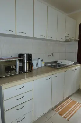 A cozinha ou kitchenette de Chalé em Condomínio com