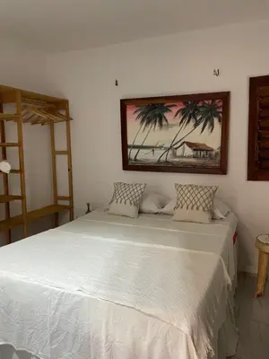 Uma cama ou camas num quarto em Casa De Vó