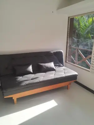 Uma área de estar em Eco Paradise 227
