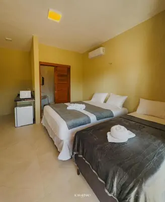 Uma cama ou camas num quarto em Icaraizinho House