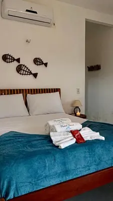 Uma cama ou camas num quarto em Maré House