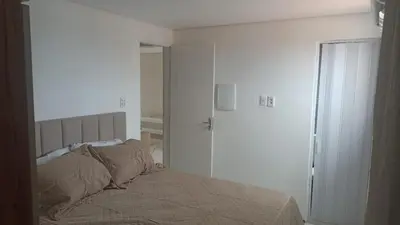 Uma cama ou camas num quarto em Apartmento em Fortaleza, Residencial Monique
