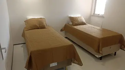 Uma cama ou camas num quarto em Apartmento em Fortaleza, Residencial Monique
