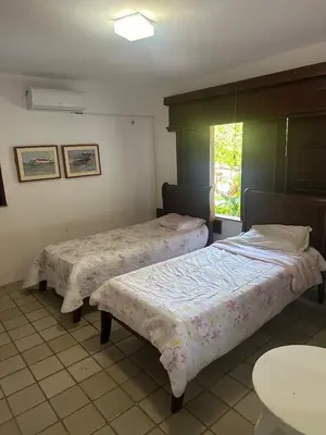 Uma cama ou camas num quarto em Beach house in Porto das Dunas with four suites