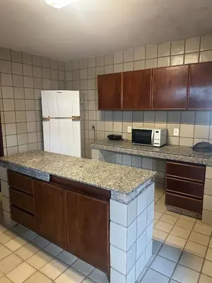 A cozinha ou kitchenette de Beach house in Porto das Dunas with four suites