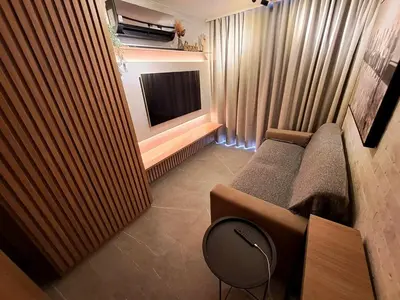 Uma televisão e/ou sistema de entretenimento em Fortaleza Premium Stay Elegância e exclusividade