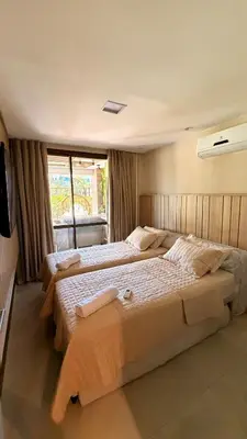 Uma cama ou camas num quarto em Wai Wai Resort Cumbuco 107G