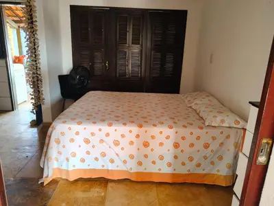 Uma cama ou camas num quarto em Nascimento BEACH