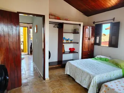 Uma cama ou camas num quarto em Nascimento BEACH