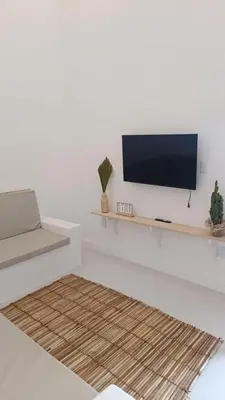 Uma televisão e/ou sistema de entretenimento em Casa Carnaubas