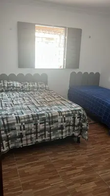 Uma cama ou camas num quarto em Casa Taiba