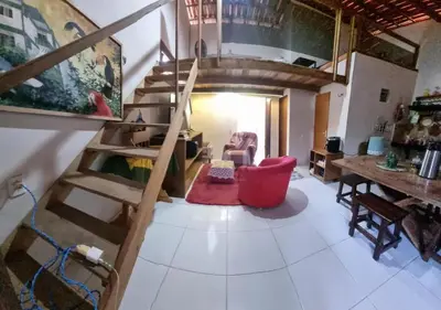 Uma área de estar em Refúgio Rústico