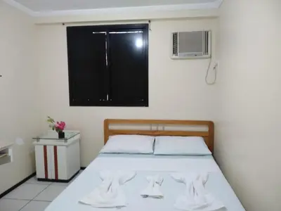 Uma cama ou camas num quarto em Porto de Iracema- Ferias Temporada Fortaleza