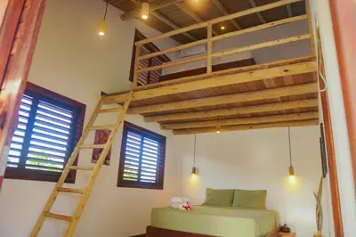 Uma cama ou camas num quarto em Villa Mandala