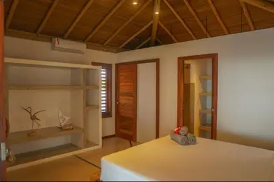 Uma cama ou camas num quarto em Villa Mandala