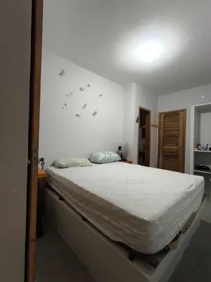 Uma cama ou camas num quarto em Casa mirante de Parajuru