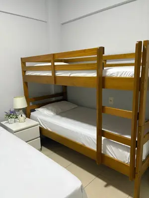 Uma cama ou camas num quarto em Apartamento Porto das Dunas