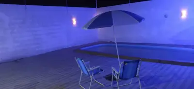 A piscina em ou perto de PC temporada casa próximo alguns pontos turístico