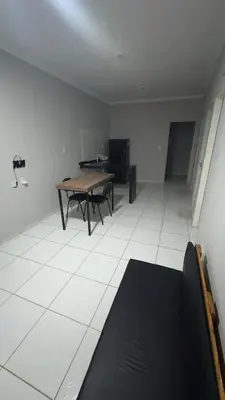 Uma televisão e/ou sistema de entretenimento em Condomínio Avenida