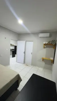 Uma cama ou camas num quarto em Condominio Avenida