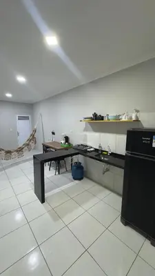 A cozinha ou kitchenette de Condominio Avenida