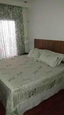 Uma cama ou camas num quarto em Casas do Ton Guaramiranga, no Cond Mont Flor Condominium