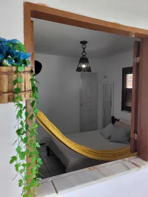 Uma cama ou camas num quarto em Apto pé na areia, paradisíaca praia do presídio CE