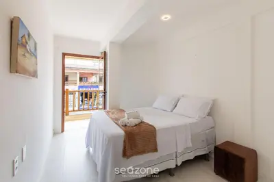 Uma cama ou camas num quarto em Ed Cumbuco Real | Aptos Completos a 160m da Praia - MCUs