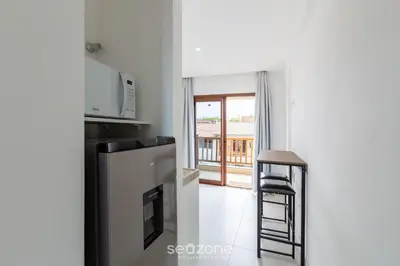 A cozinha ou kitchenette de Ed Cumbuco Real | Aptos Completos a 160m da Praia - MCUs