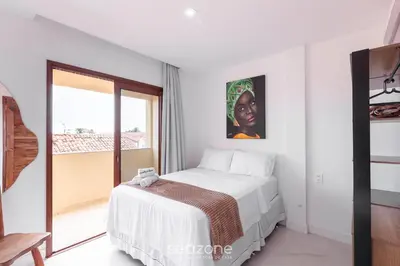 Uma cama ou camas num quarto em Ed Cumbuco Real | Aptos Completos a 160m da Praia - MCUs