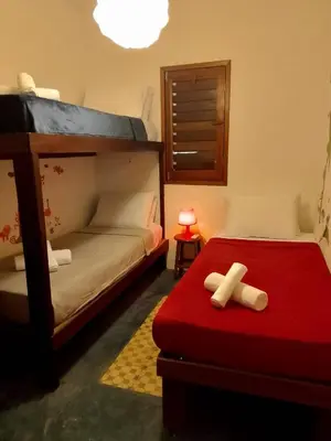 Uma cama ou camas num quarto em Casa Bosque Guajiru