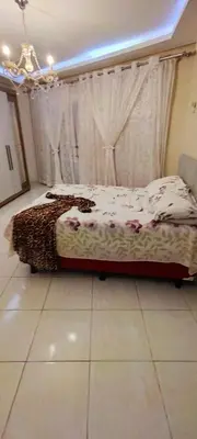 Uma cama ou camas num quarto em Casa inigualavel