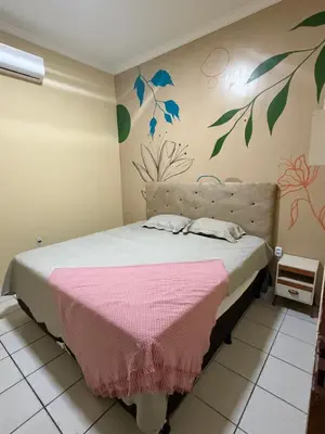 Uma cama ou camas num quarto em Sítio sonho meu