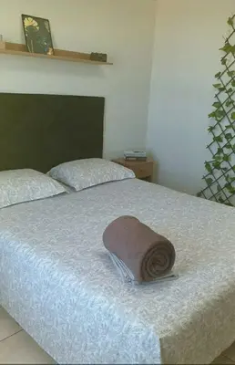Uma cama ou camas num quarto em Apartment in Praia do Futuro
