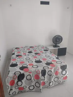 Uma cama ou camas num quarto em AZURE residence