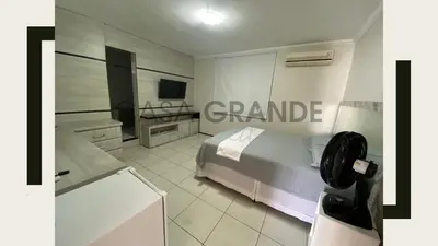Uma televisão e/ou sistema de entretenimento em Pousada Casa Grande Aeroporto