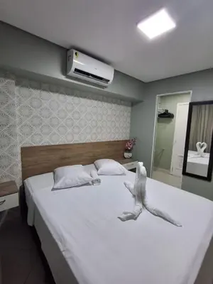 Uma cama ou camas num quarto em Apart 203 Vista Mar