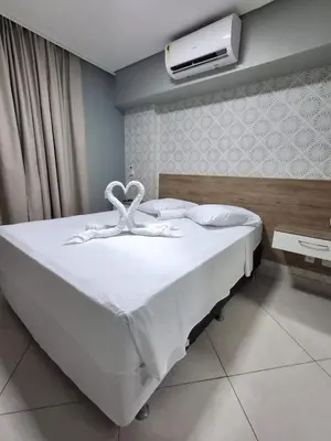 Uma cama ou camas num quarto em Apart 203 Vista Mar