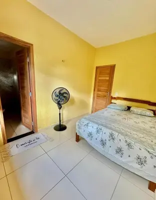 Uma cama ou camas num quarto em Casa a 6 km de Guaramiranga
