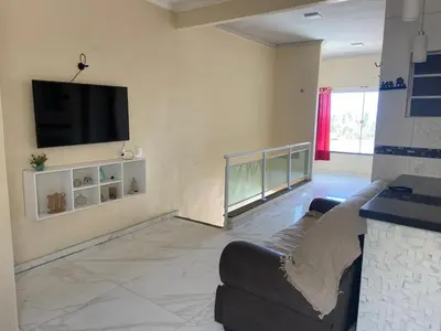 Uma televisão e/ou sistema de entretenimento em Casa duplex vista mar, p 10 pessoas ou MAIS a combinar