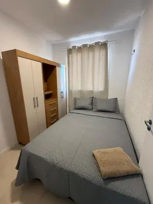 Uma cama ou camas num quarto em Apartment near Croco Beach Cool