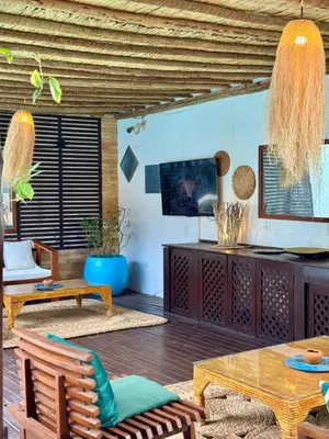Uma área de estar em Villa Puglia Jeri Suítes
