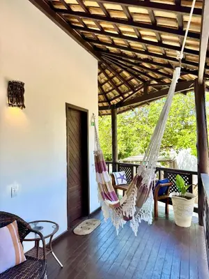 Uma área de estar em Villa Puglia Jeri Suítes