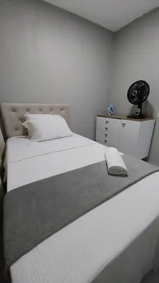Uma cama ou camas num quarto em Apartamento em Fortaleza