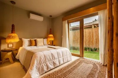 Uma cama ou camas num quarto em Casa Terra - Praia do Preá