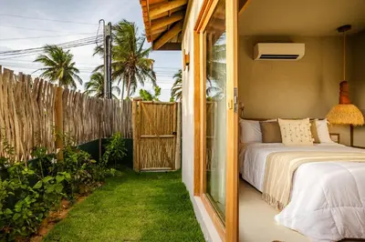 Uma cama ou camas num quarto em Casa Terra - Praia do Preá